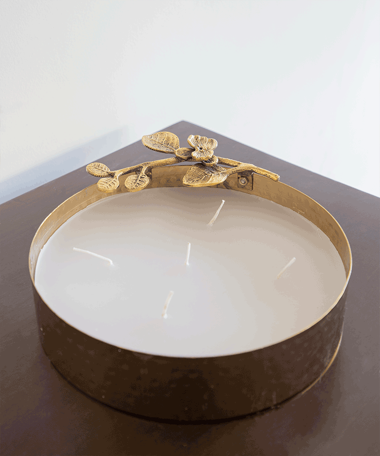 Hand Hammered Gold Metal Urli With Fragrance Wax And Flower On Stem Embellishment