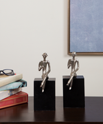 Bookends With Silver Figurines