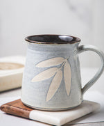 Studio Pottery Handcarved and Handglazed Light Blue Glazed with Leaf Motif Ceramic Mug (350ML Microwave & Dishwasher Safe)